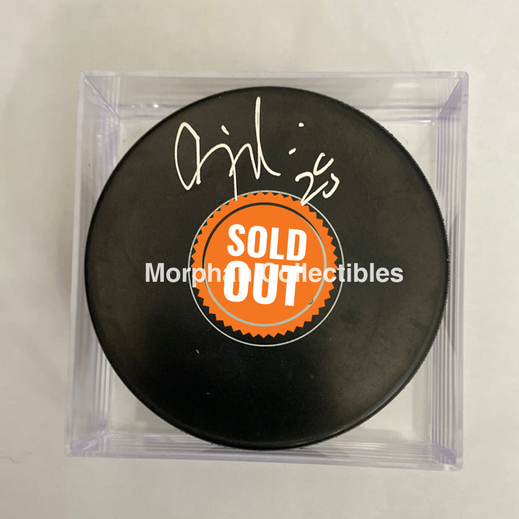 Craig Muni - Autographed Puck Edmonton Oilers