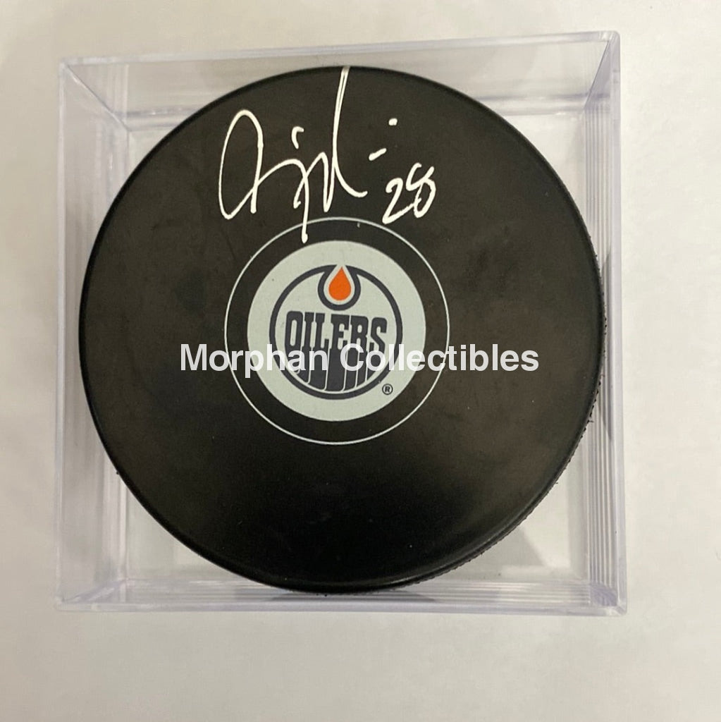 Craig Muni - Autographed Puck Edmonton Oilers