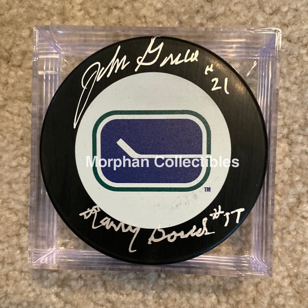 John And Larry Gould - Autographed Pick Vancouver Canucks Puck