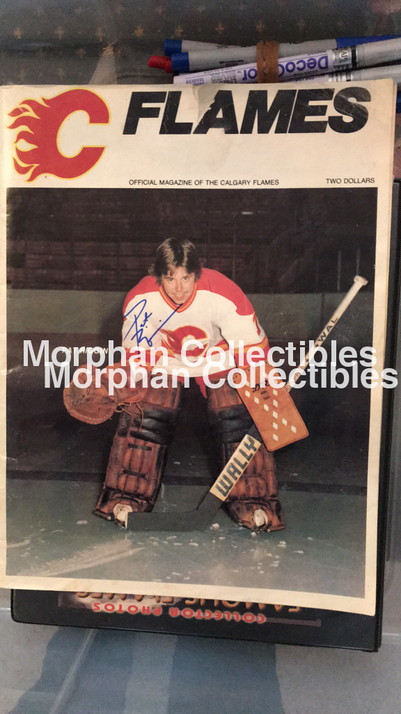 Pat Riggin- Autographed Programs Photo