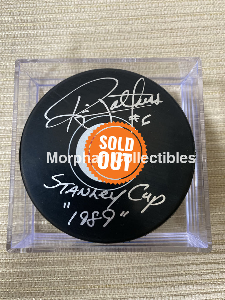 Ric Nattress - Autographed Calgary Puck