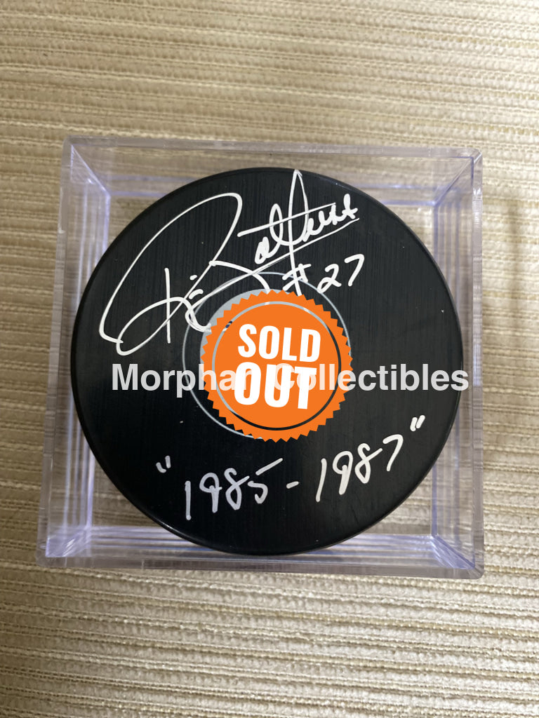 Ric Nattress - Autographed St Louis Puck
