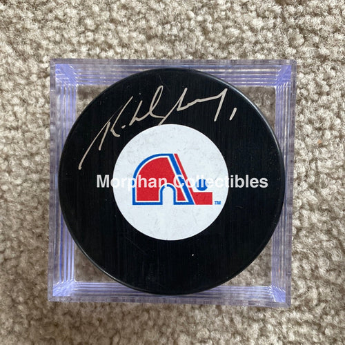 Richard Sevigny - Autographed Puck Quebec Nordiques