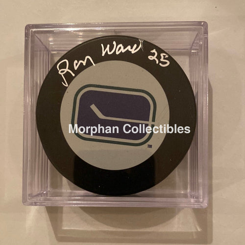 Ron Ward - Autographed Puck Vancouver Canucks